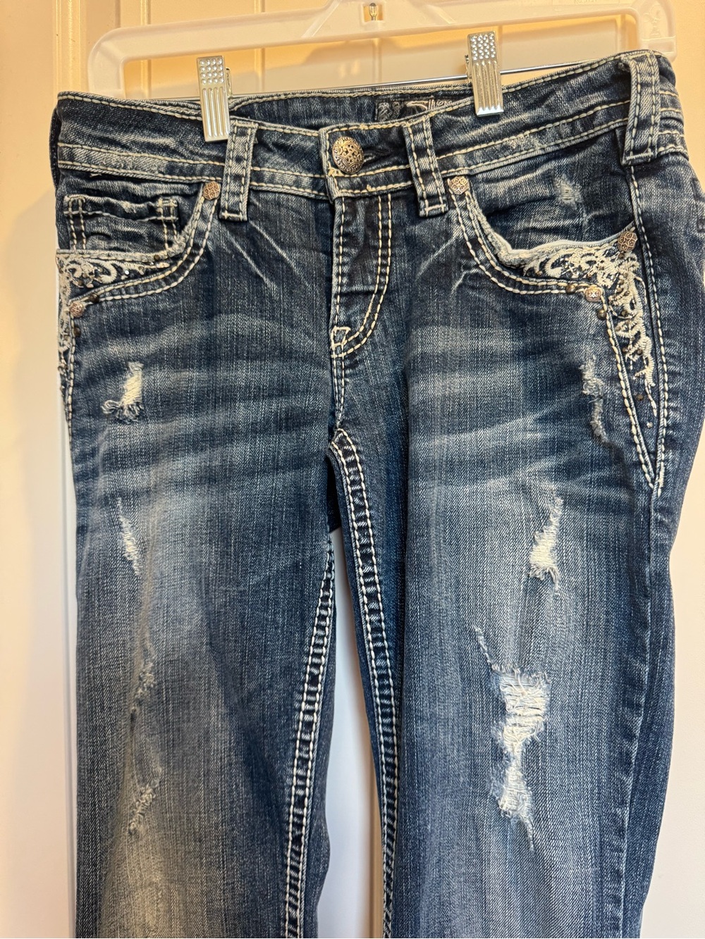 Silver Jeans Dark Blue Distressed low boot Jeans with Embroidered Accents